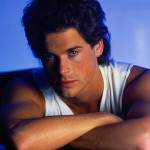 Actor Rob Lowe Leaning on a Table